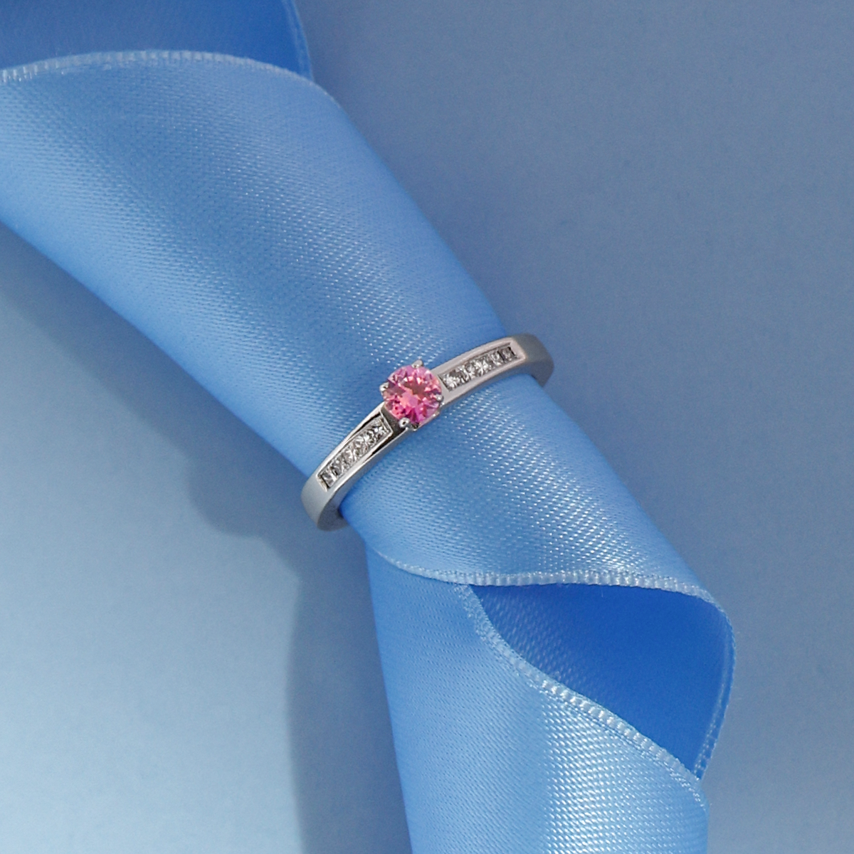 18ct White Gold Pink Sapphire & Diamond Channel Set Shoulders Solitaire Ring