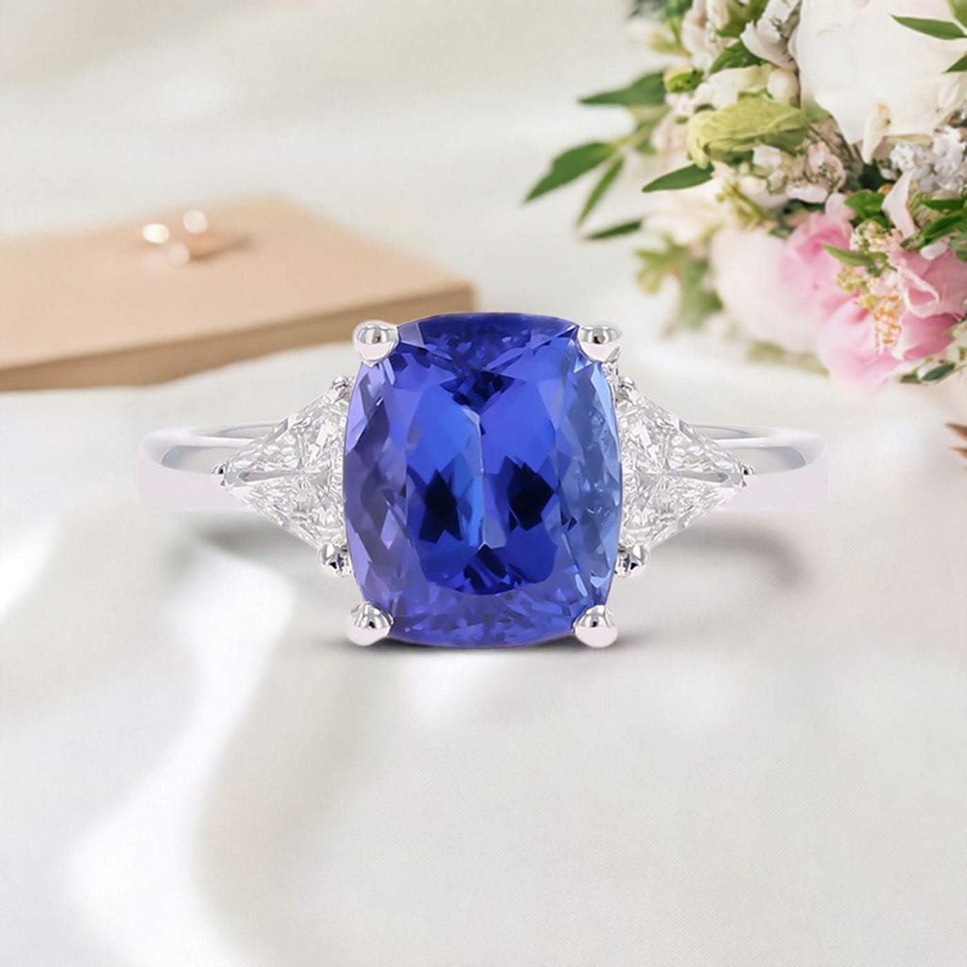 18ct White Gold Cushion Shaped Certified 3.86ct Tanzanite & 0.66ct Diamond Trilogy Ring