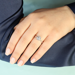 Model wears 18ct White Gold Trilliant Cut 0.65ct Diamond Flower Ring