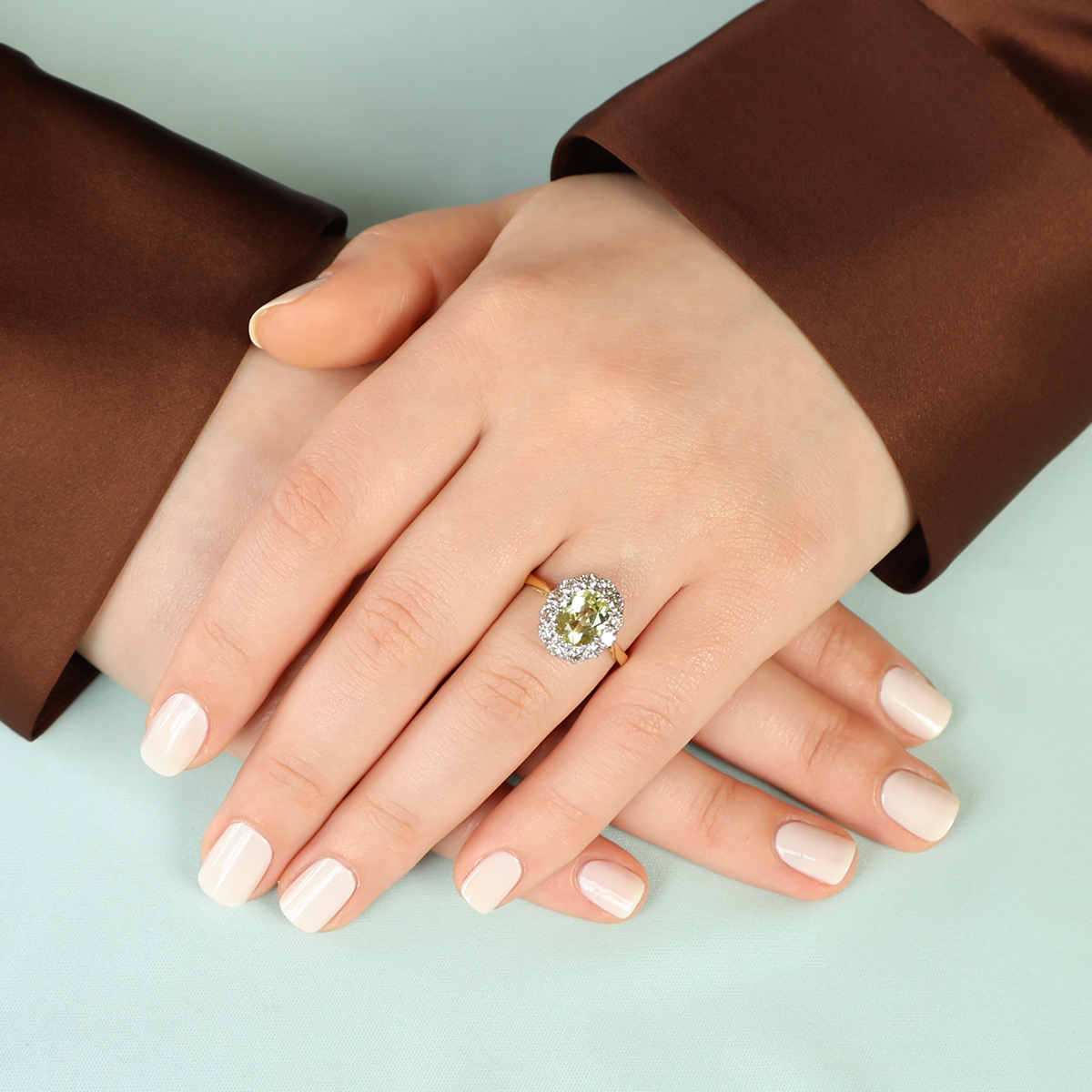 Mode wears 18ct Yellow Gold Oval Shaped Chrysoberyl & Diamond Cluster Ring