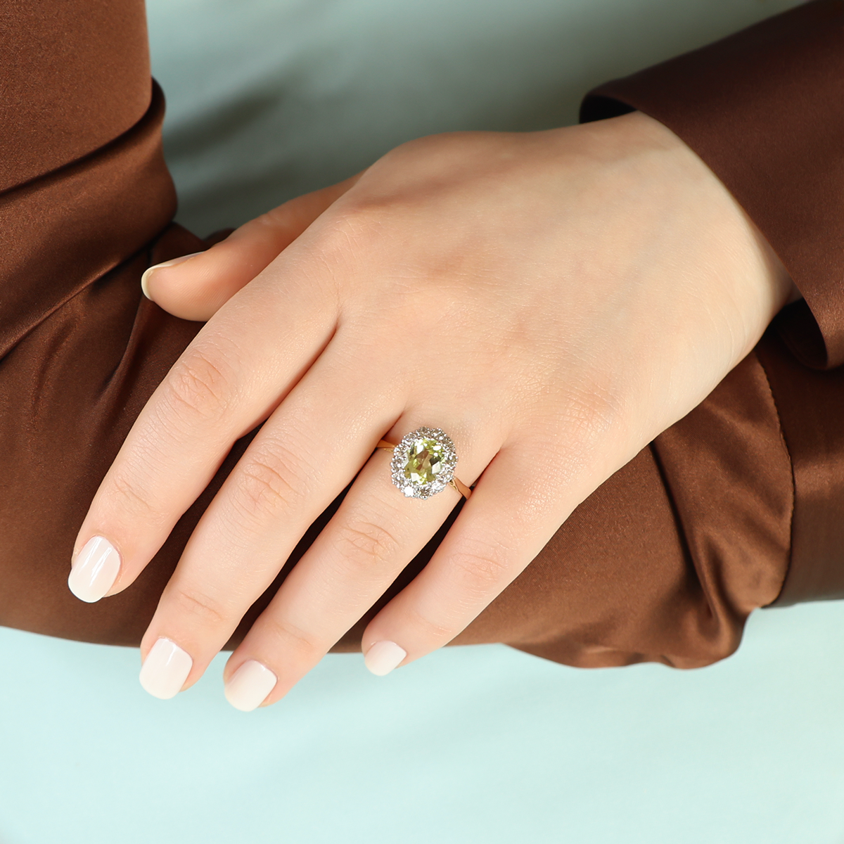 Model wears 18ct Yellow Gold Oval Shaped Chrysoberyl & Diamond Cluster Ring