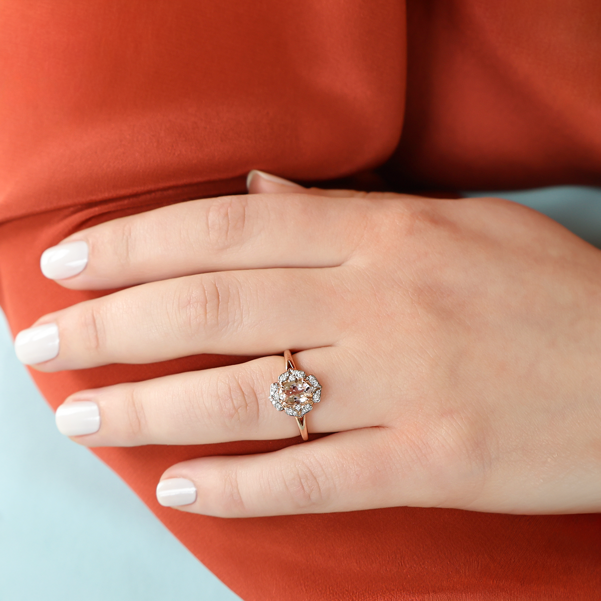 Model wears 9ct Rose Gold Morganite & Diamond Cluster Ring