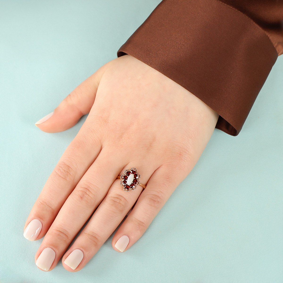 Model wears 9ct Yellow Gold Opal & Garnet Cluster Ring