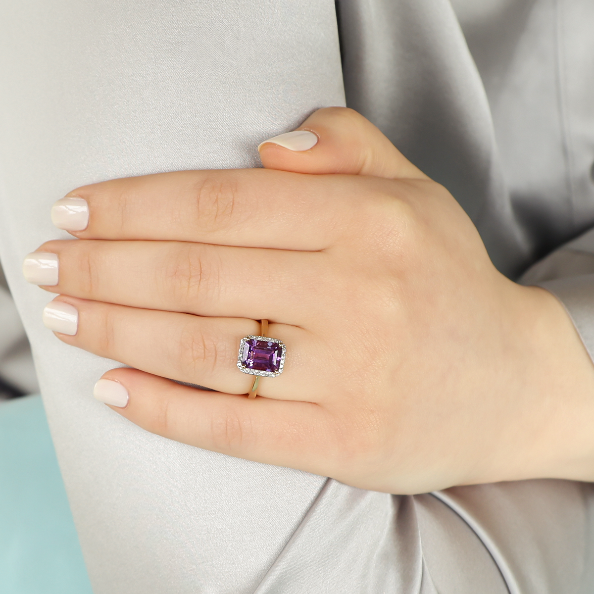 Model wears 9ct Yellow Gold Octagonal Amethyst & Diamond Cluster Ring