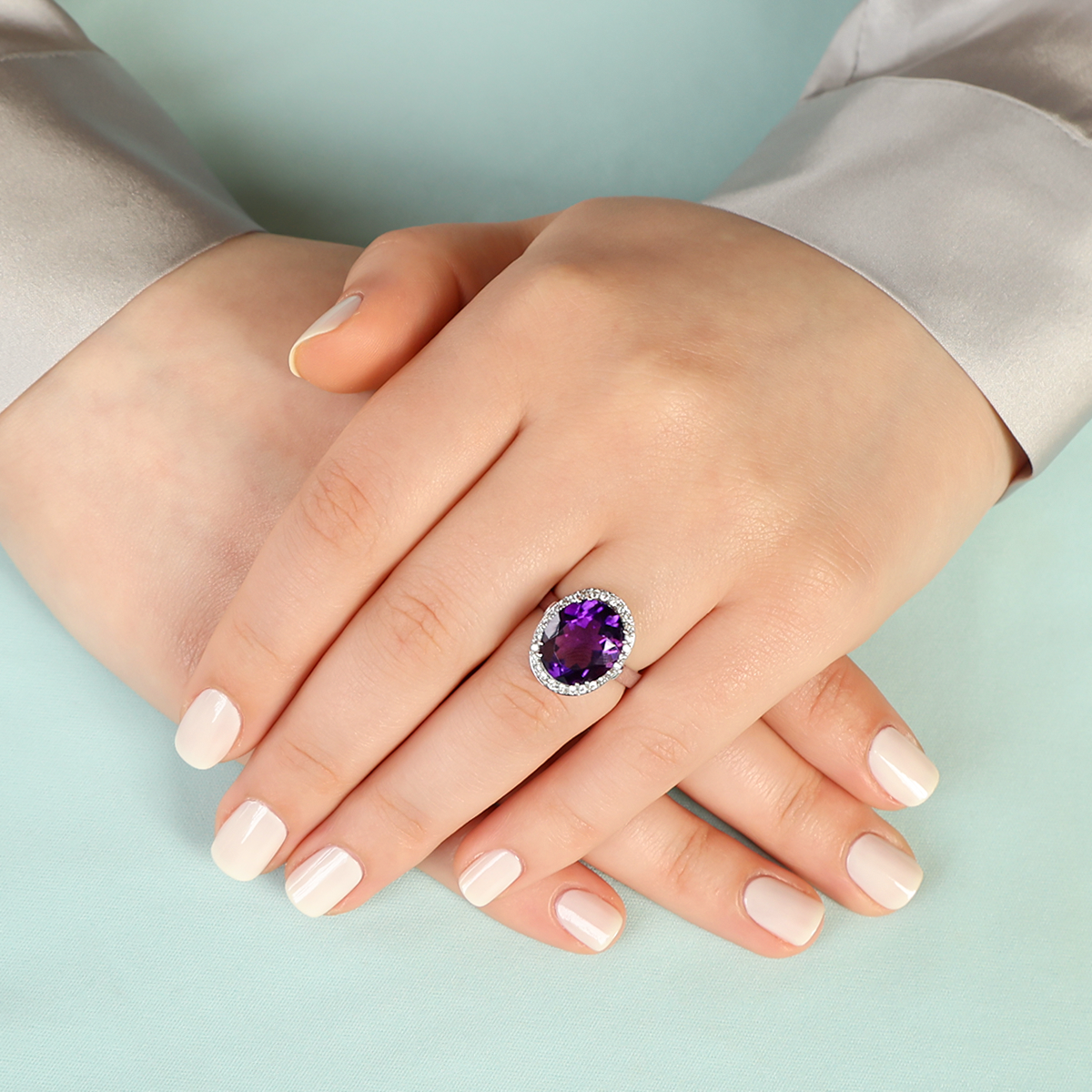 Model wears 18ct White Gold Amethyst & Diamond Oval Cocktail Ring