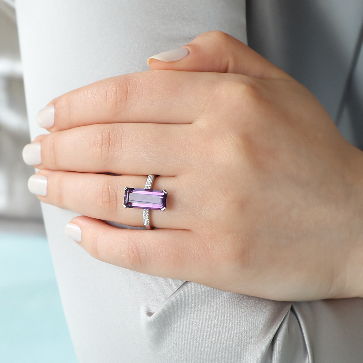 Model wears 9ct White Gold Long Octagon Shaped Amethyst & Diamond Cocktail Ring