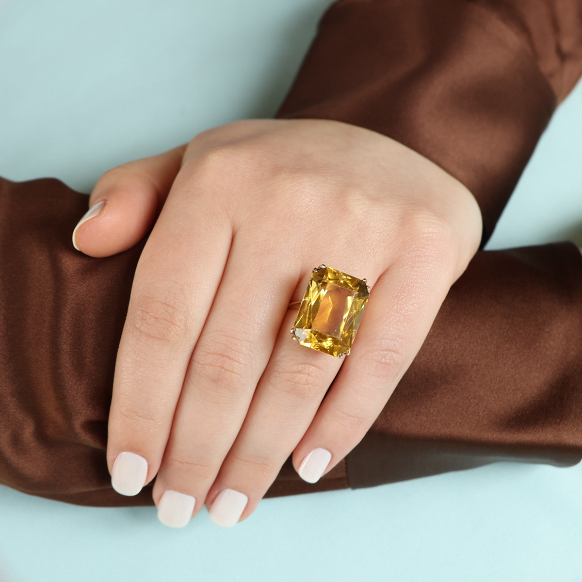 Model wears 9ct Yellow Gold Radiant Cut Citrine Cocktail Ring