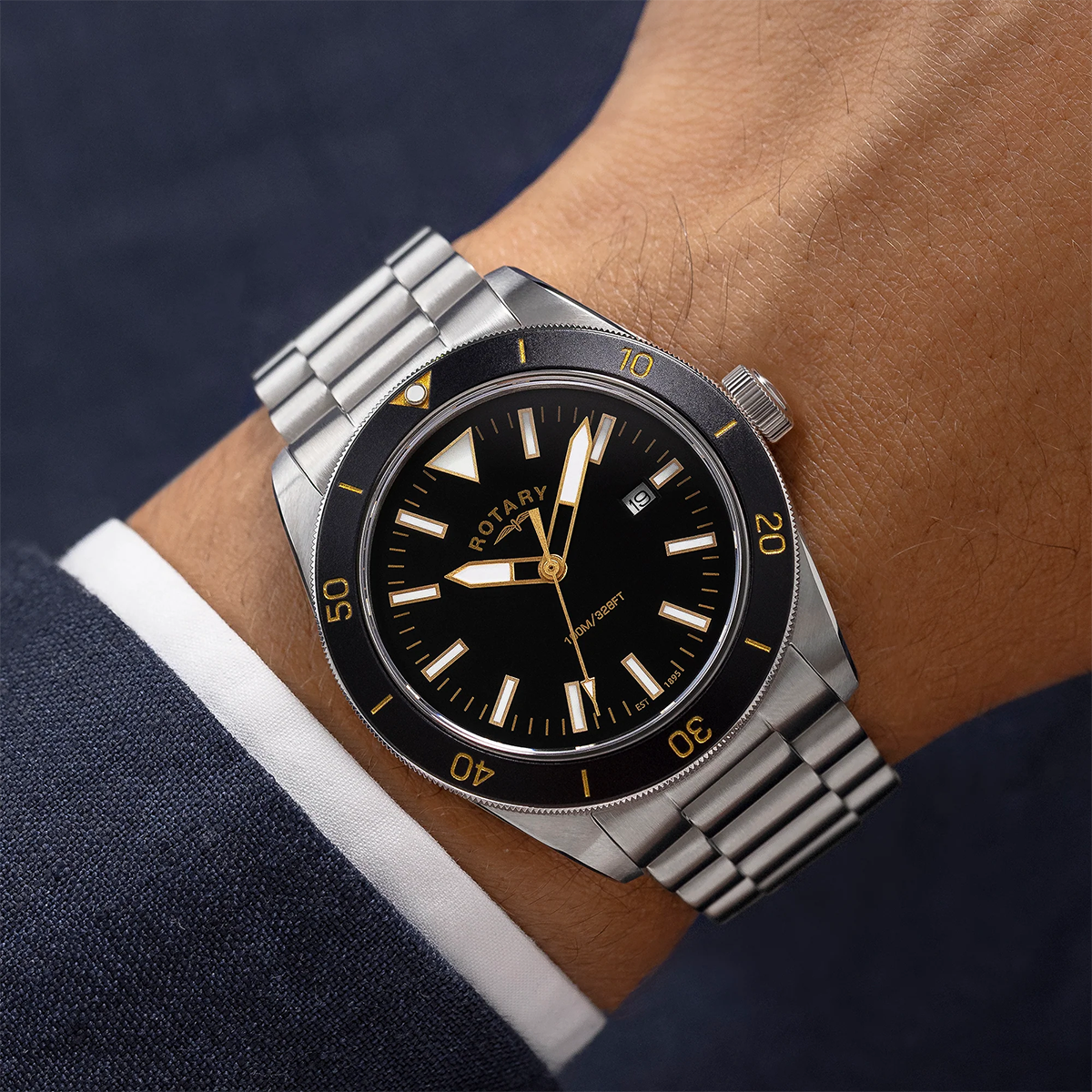 Model wears Rotary Apex 100 Watch, Black Bezel with Stainless Steel Bracelet - RGB10001/06