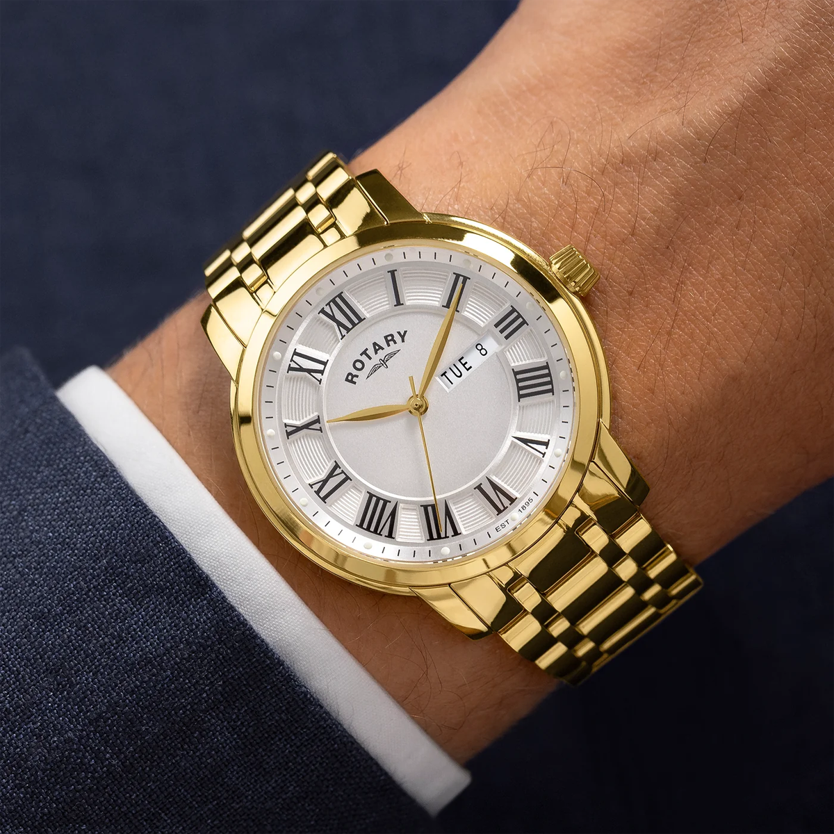 Model wears Rotary Heritage Gold Plated Watch, White Dial with Roman Numerals RGB10022/70