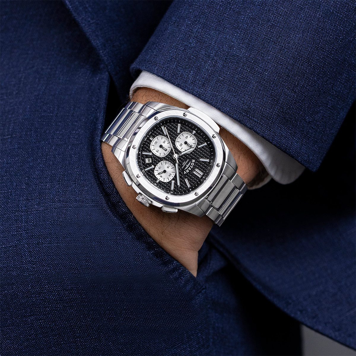 Model wears Rotary Apex 100 Chronograph, Black Dial with Stainless Steel Bracelet RGB10027/04