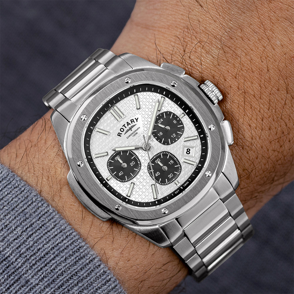 Model wears Rotary Apex 100 Chronograph, White Dial with Stainless Steel Bracelet RGB10031/07