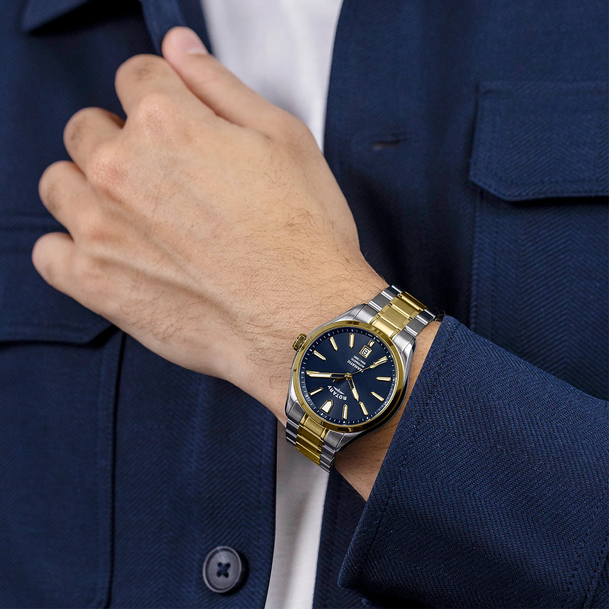 Model wears Rotary Seamatic 100 Automatic 2-Tone Watch, Blue Dial with Stainless Steel Bracelet RGB10034/05