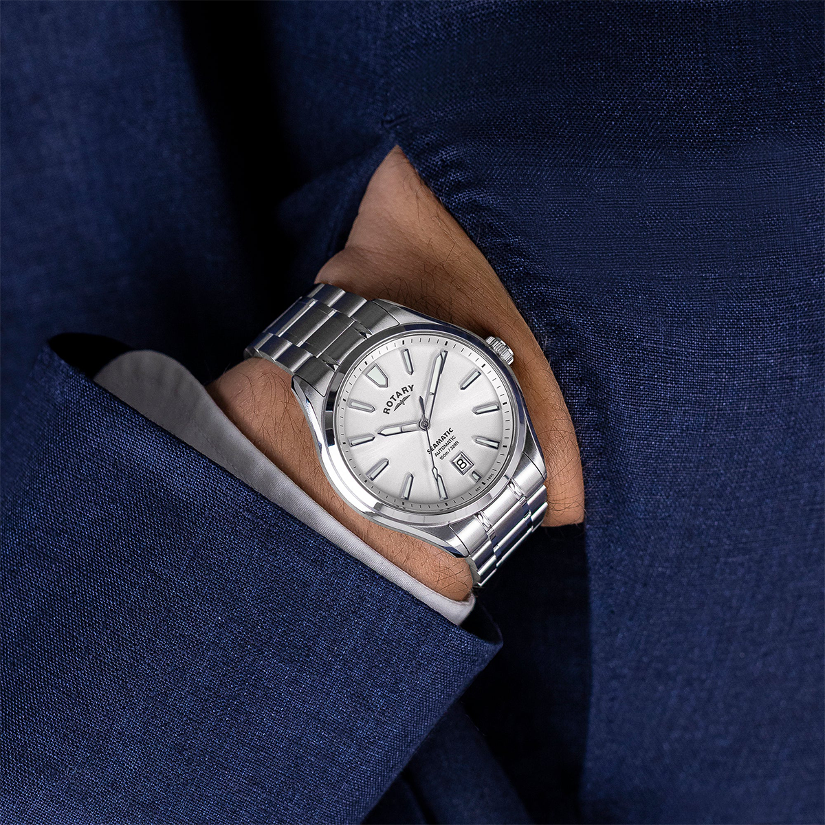 Model wears Rotary Seamatic 100 Automatic, Silver Dial with Stainless Steel Bracelet RGB10035/06