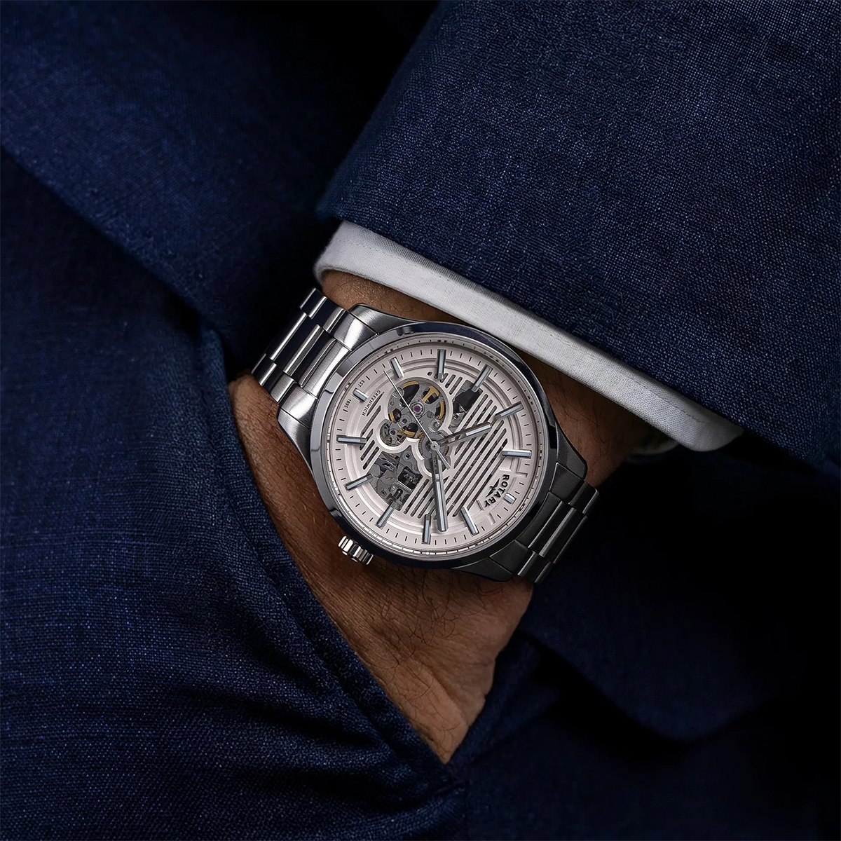 Model wears Rotary Greenwich GT1 Automatic, Silver Dial with Stainless Steel Bracelet - RGB10073/01