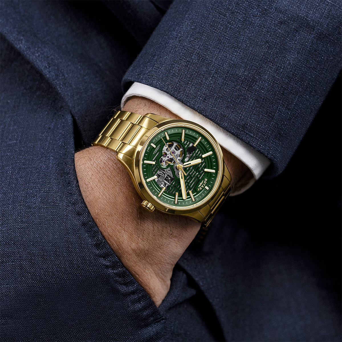 Model wears Rotary Rotary Greenwich GT1 Automatic, Green Dial with Gold Plated Bracelet RGB10074/24