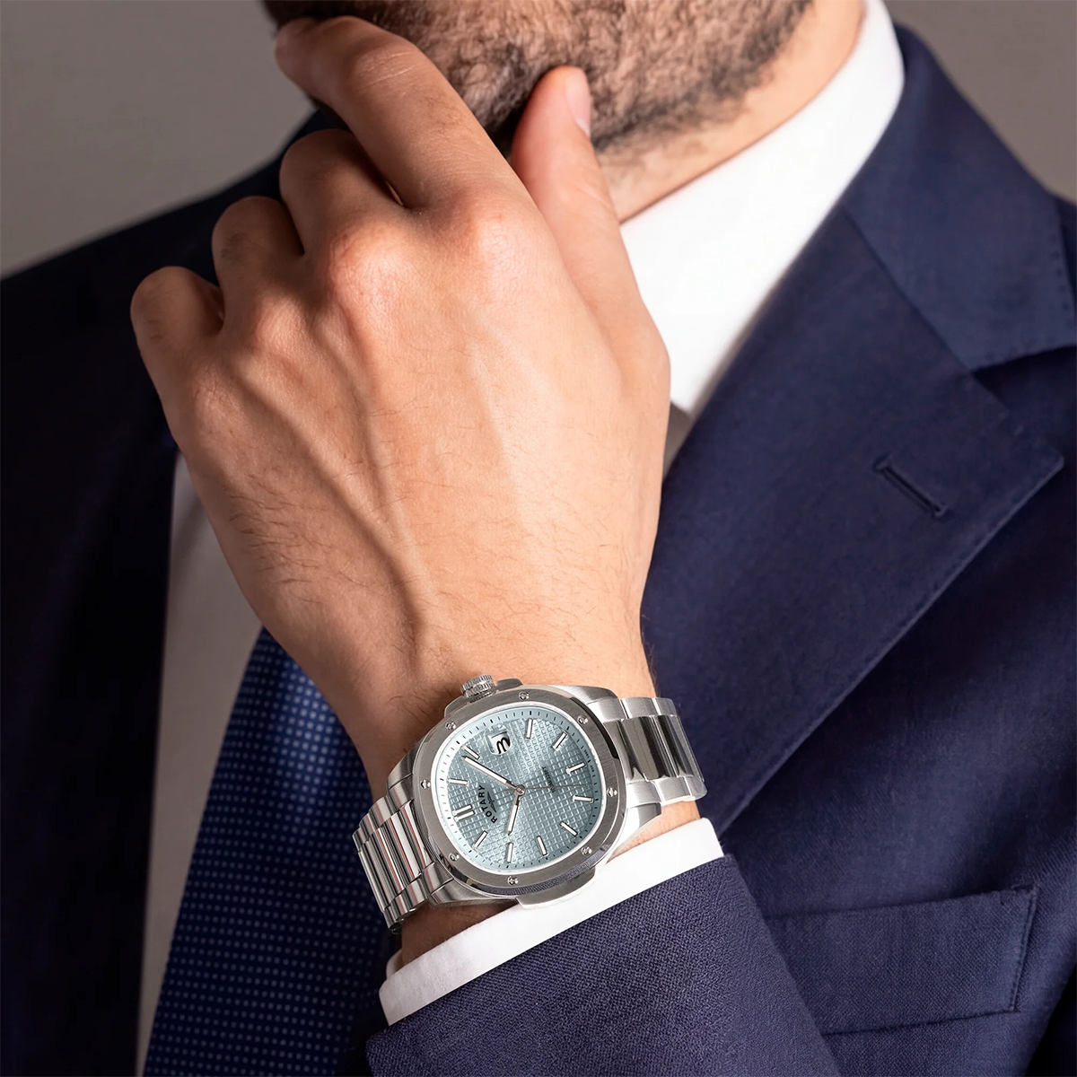 Model wears Rotary Apex 100, Light Blue Dial with Stainless Steel Bracelet RGB10077/57