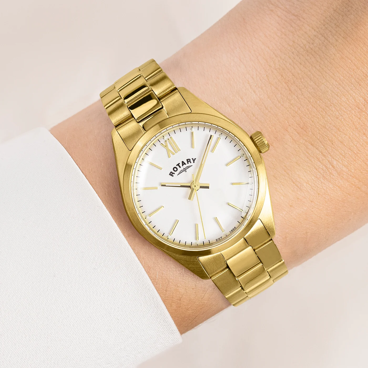 Model wears Rotary Heritage Ladies 32mm, White Dial with Gold Plated Bracelet RLB10006/01