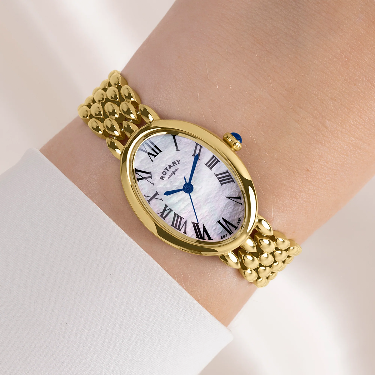 Model wears Rotary Heritage Astoria, Mother of Pearl Dial with Gold Plated Bracelet - RLB10024/07