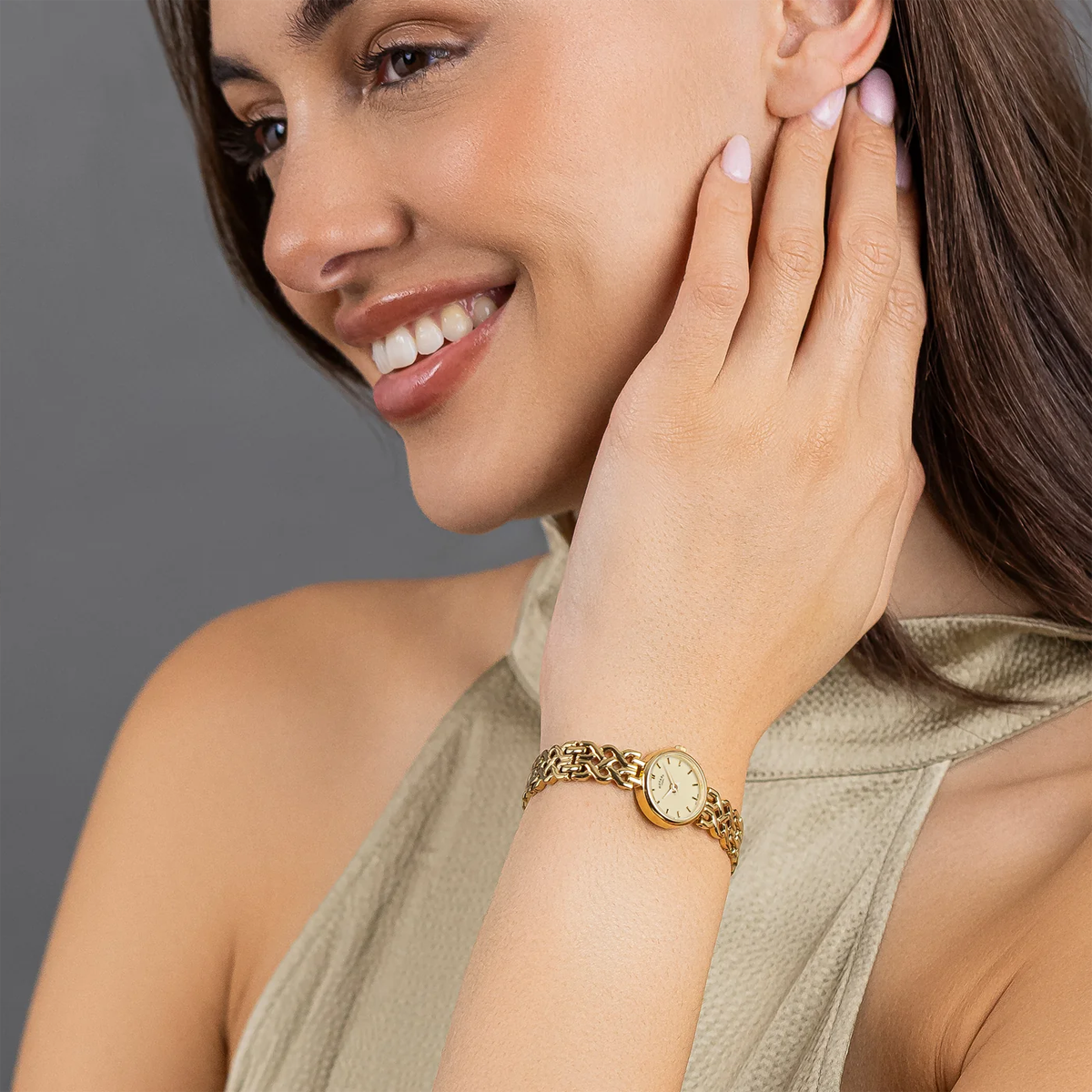 Model wears Rotary 1895, Champagne Dial with Gold Plated Bracelet RLB10046/03