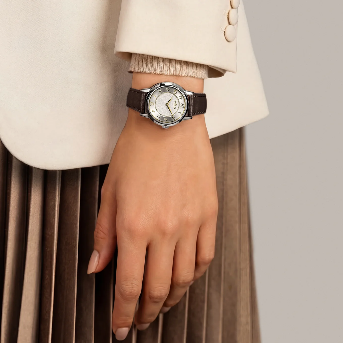 Model wears Rotary Heritage Ladies Stainless Steel, White Dial with Brown Leather Strap RLS10055/41