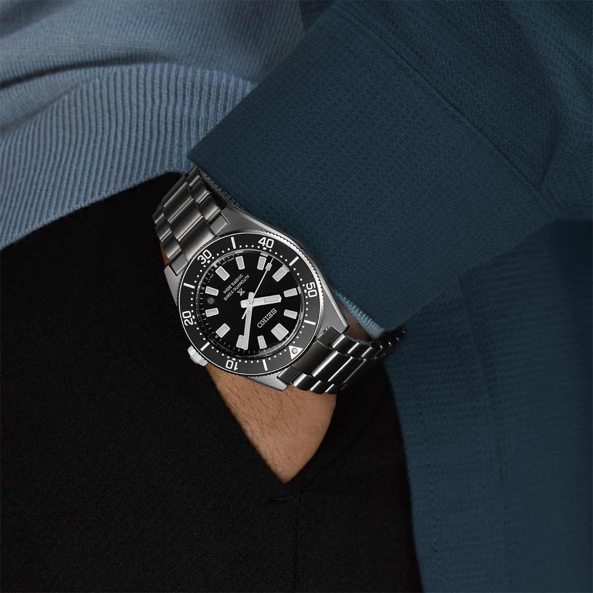 Model wears Seiko Prospex 1965 Heritage Diver’s Revival 3-day 300m In Cove Black - SPB453J1