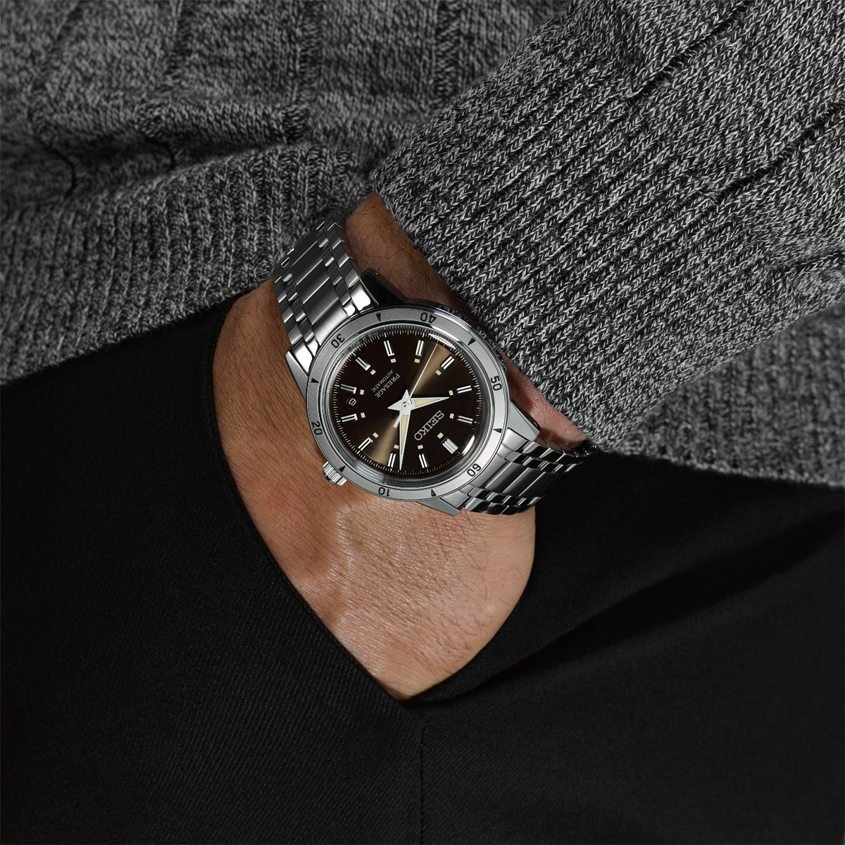 Model wears Seiko Presage Style 60s 'Elegant Yet Rugged' In Brown - SRPL09J1