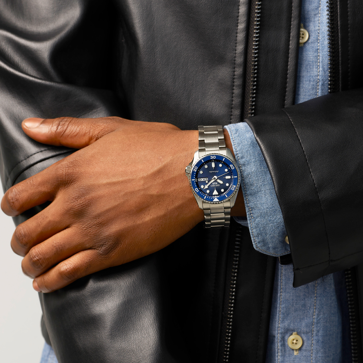 Model wears Seiko 5 Sports SKX New Colour Collection 'Street Denim' - SRPL77K1