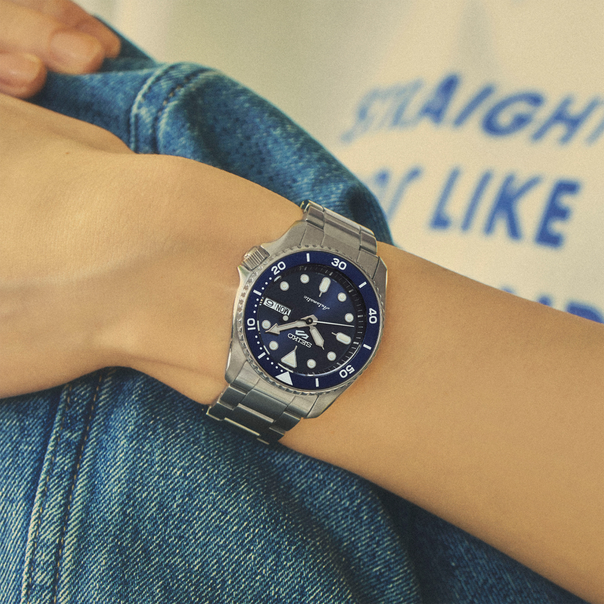 Model wears Seiko 5 Sports SKX New Colour Collection ‘Street Denim’ - SRPL77K1