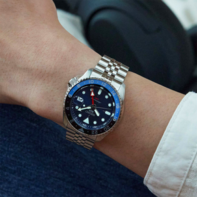 Model wears Seiko 5 Sports “Blueberry” GMT, SKX Re-Interpretation - SSK003K1