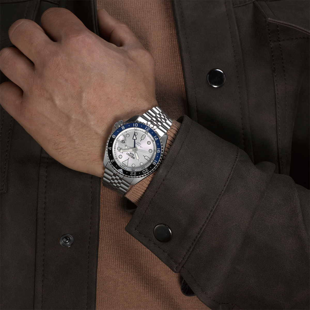 Model wears Seiko 5 Sports SKX GMT Sky Blue, Silver Cloud - SSK033K1