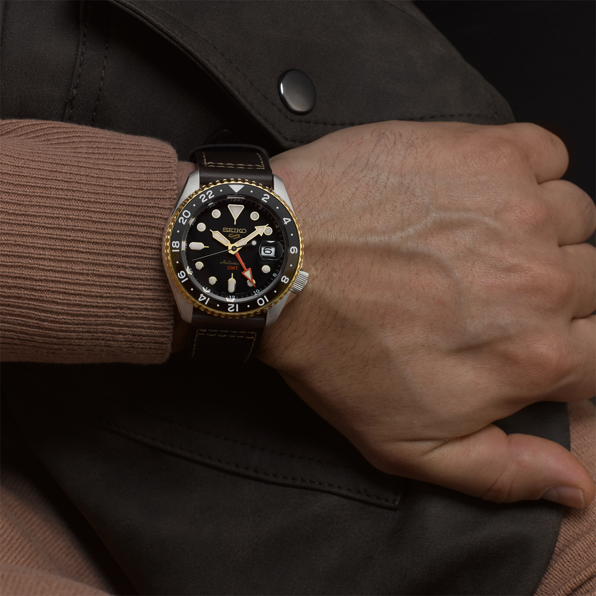 Model wears Seiko 5 Sports SKX GMT In Mocha - SSK036K1