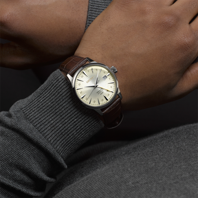 Model wears Seiko Presage 'Acacia' Cocktail Time GMT, Cream Dial with Brown Leather Strap - SSK041J1