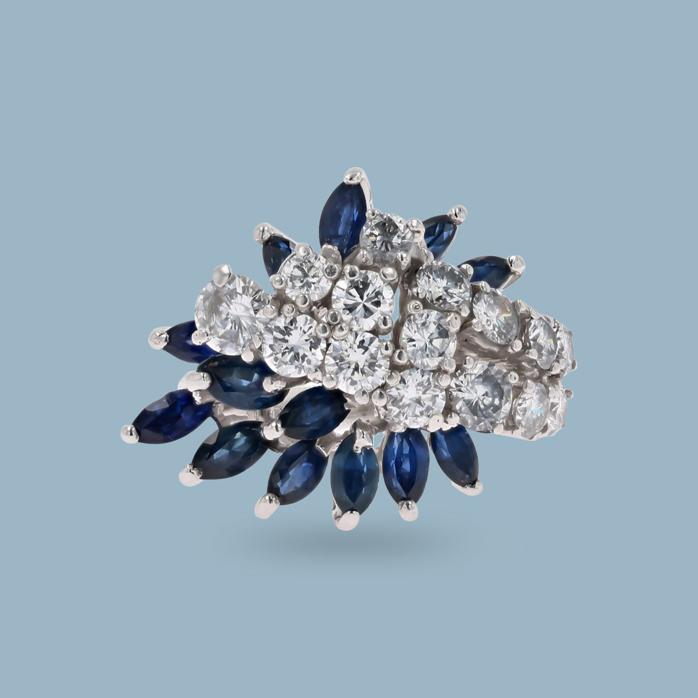 18ct White Gold Marquise Cut Sapphire and Round Cut Diamond Cluster Ring