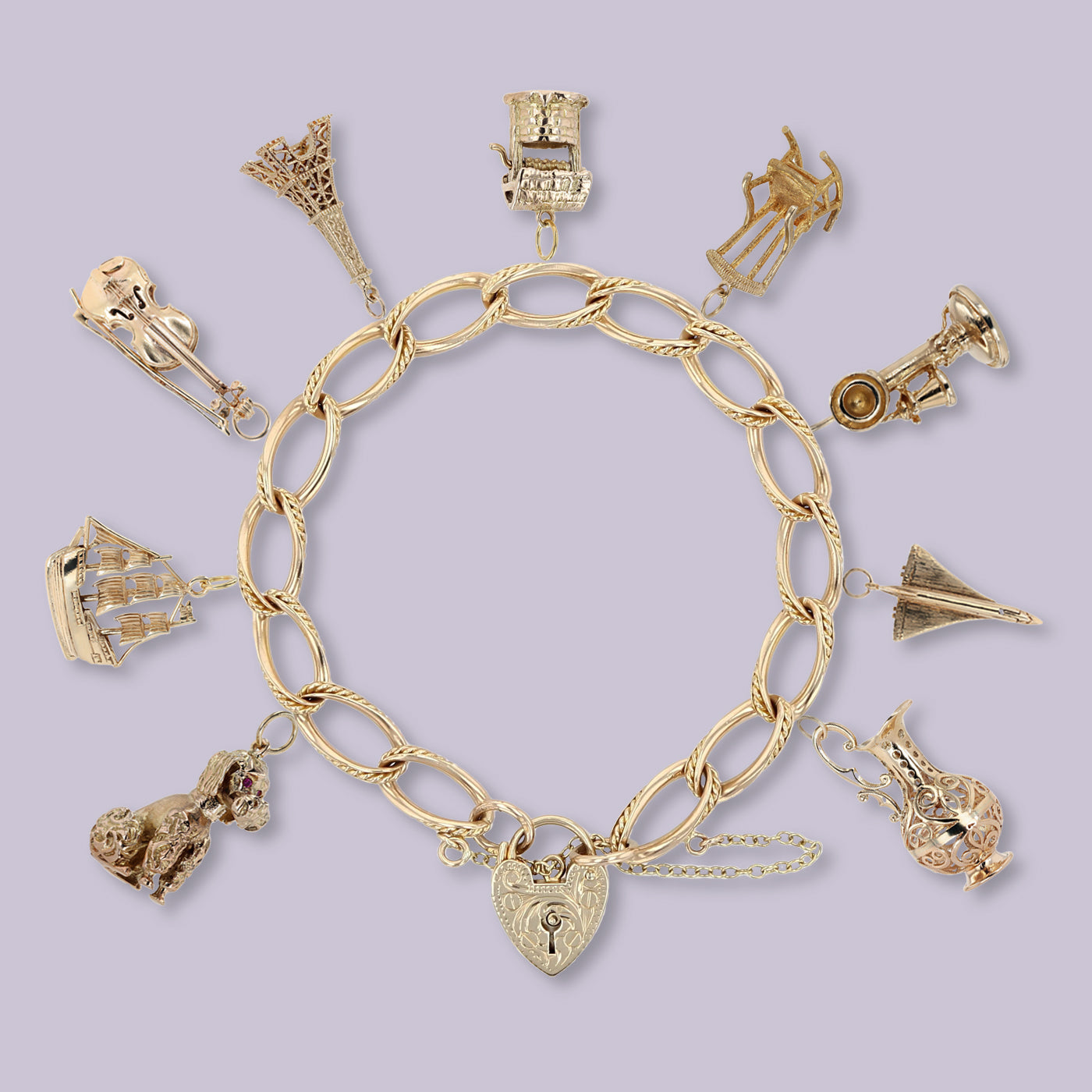 9ct Yellow Gold Fancy Link Charm Bracelet with Charms.
