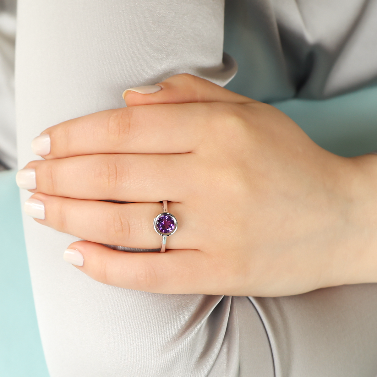 Model wears 18ct White Gold Amethyst Bezel Set Solitaire Ring