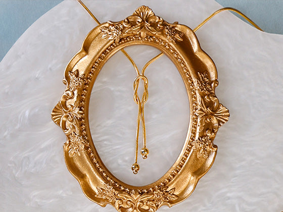 9ct Yellow Gold Love Knot Snake Beaded Necklace