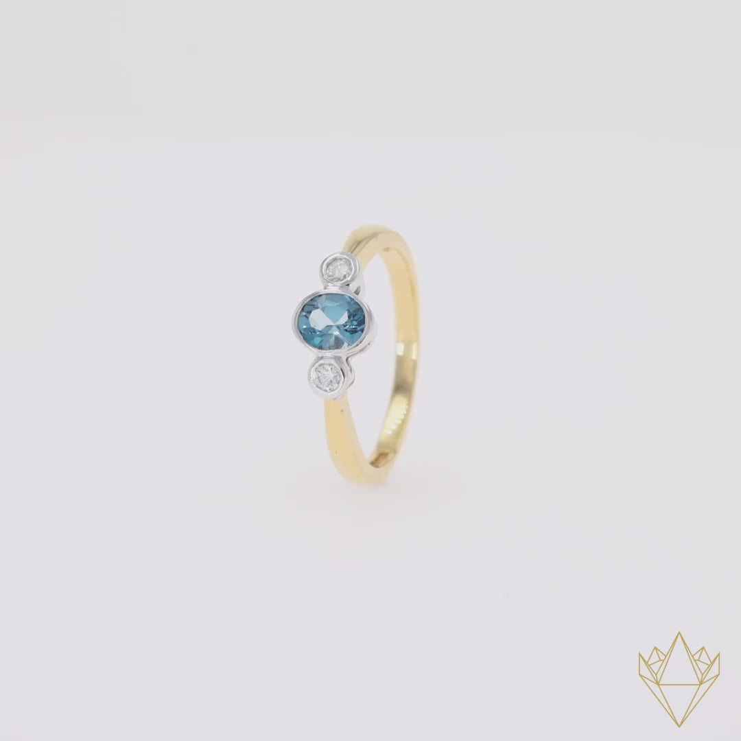 18ct Yellow Gold Blue Topaz & Diamond Bezel Set Trilogy Ring - 360 Video