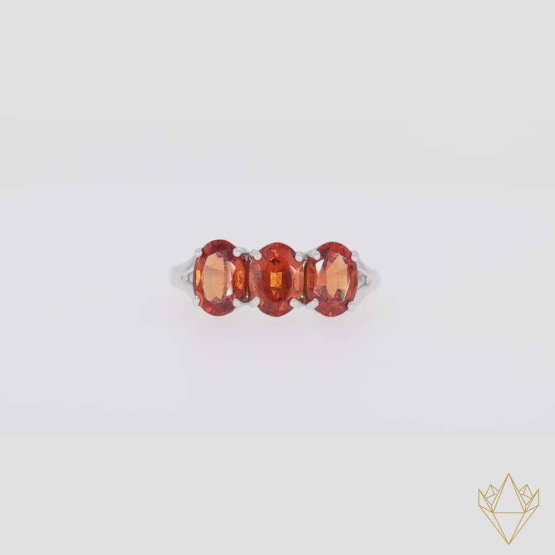 9ct White Gold Spessartine Garnet Trilogy Ring - Video