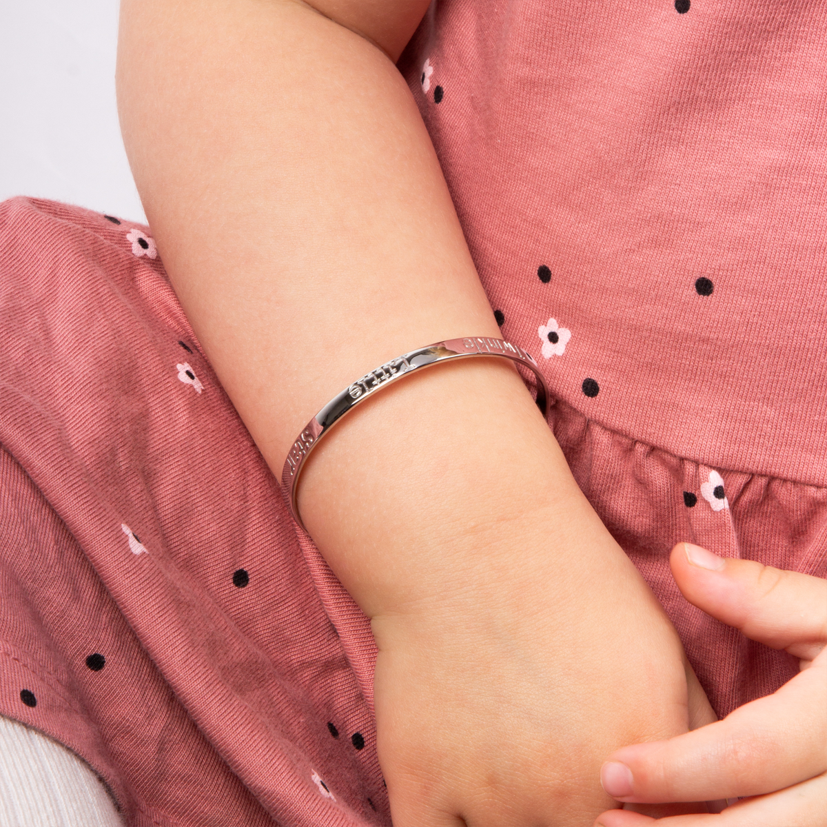 Model wears Sterling Silver Twinkle Little Star Expandable Bangle With Diamond