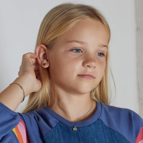 Model wears Recycled Sterling Silver Heart Stud Earrings with Rose Gold Plated Detail & Diamond