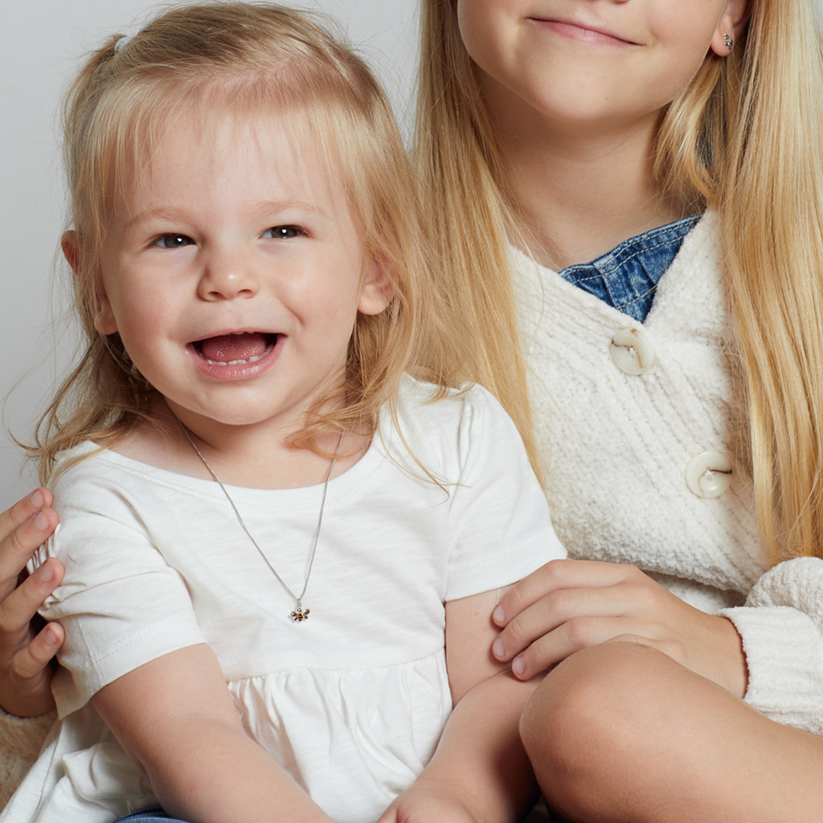 Model wears Recycled Sterling Silver Bee Necklace With Yellow Gold Plating, Enamel & Diamond