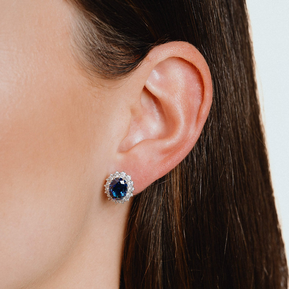 Sterling Silver Oval Shaped Blue Cubic Zirconia Cluster Stud Earrings