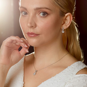 Model wears Sterling Silver Infinity Earrings & Pendant Set