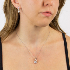 Model wears Infinity Cubic Zirconia Set Pendant & Earrings