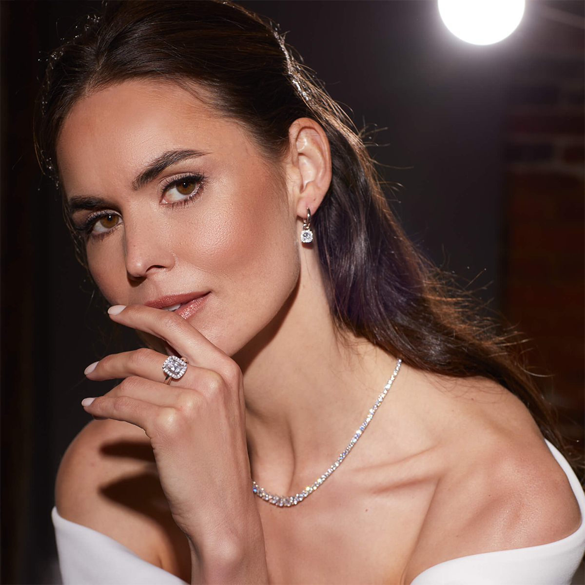 Model Wears Sterling Silver Graduated Cubic Zirconia Tennis Necklace