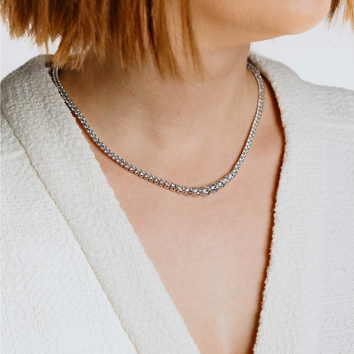 Model Wears Sterling Silver Graduated Cubic Zirconia Tennis Necklace