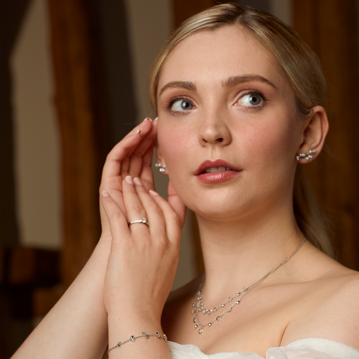 Model wears Sterling Silver Marquise & Multi-Stone Detail Jewellery Set