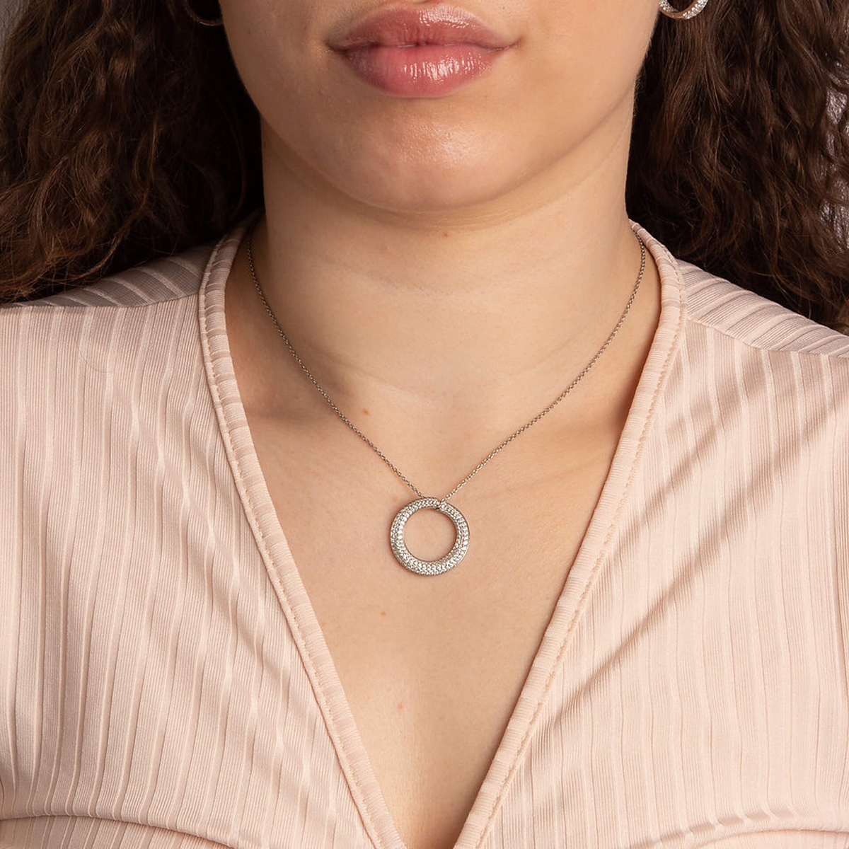 Model wears Sterling Silver Curly Hoop Cubic Zirconia Set Necklace