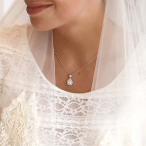 Model Wears Sterling Silver Teardrop Cubic Zirconia Halo Pendant & Chain