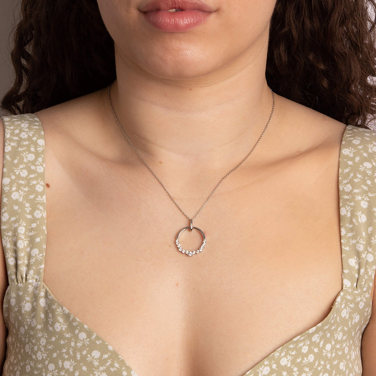 Model wears Sterling Silver Open Circle Cubic Zirconia Pendant & Chain
